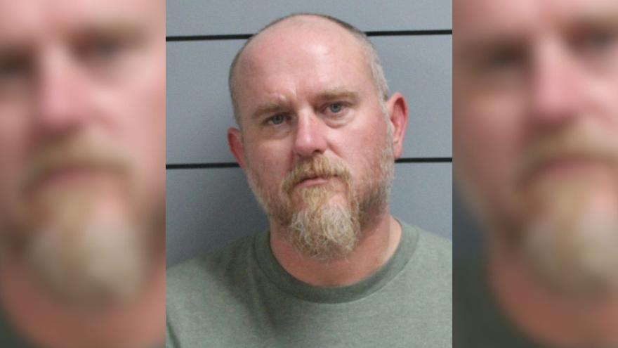 Man arrested in connection with graffiti on church, damaging cars