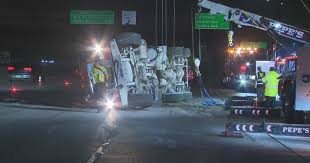 Overturned Cement Truck Shuts Down Lanes on Northbound 110 Freeway in Gardena