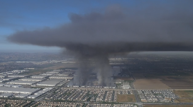 6-Alarm Warehouse Fire in Ontario, California: Kimberly-Clark Facility Engulfed, Arson Suspect Detained